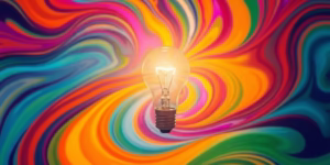 Colorful abstract shapes swirling around a light bulb.
